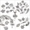 Tybetańskie wisiorki zawieszki charms 100 szt.